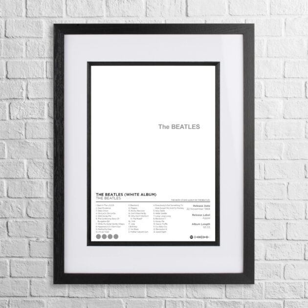 A4 custom design poster of The Beatles - White Album in a black, dual-aspect frame on a white brick background