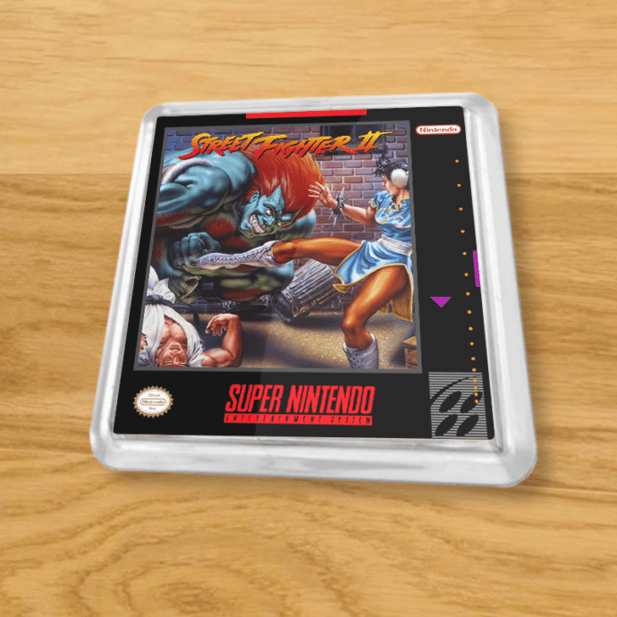Plastic Street Fighter 2 coaster on a wood table