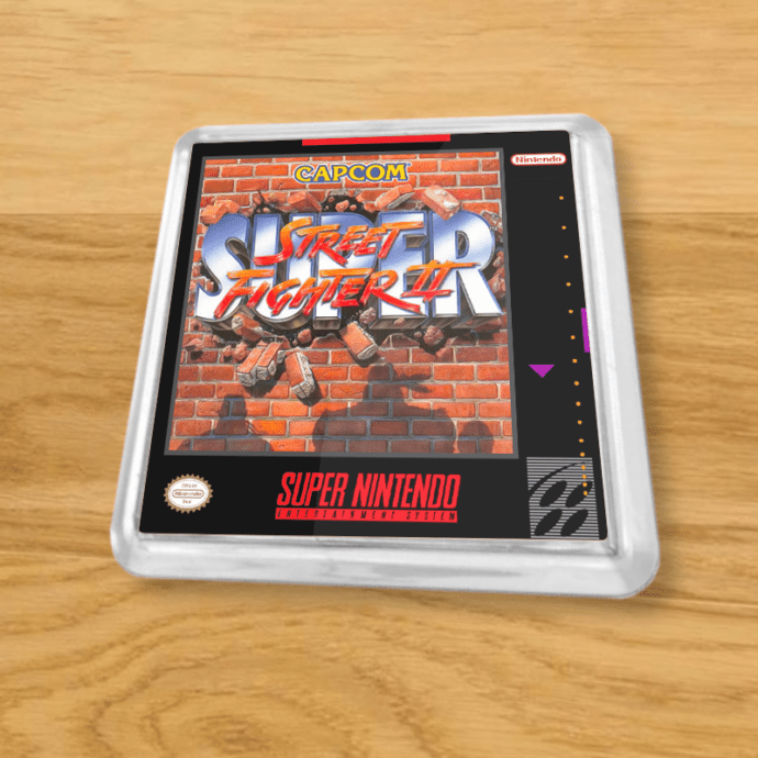 Plastic Super Street Fighter 2 coaster on a wood table