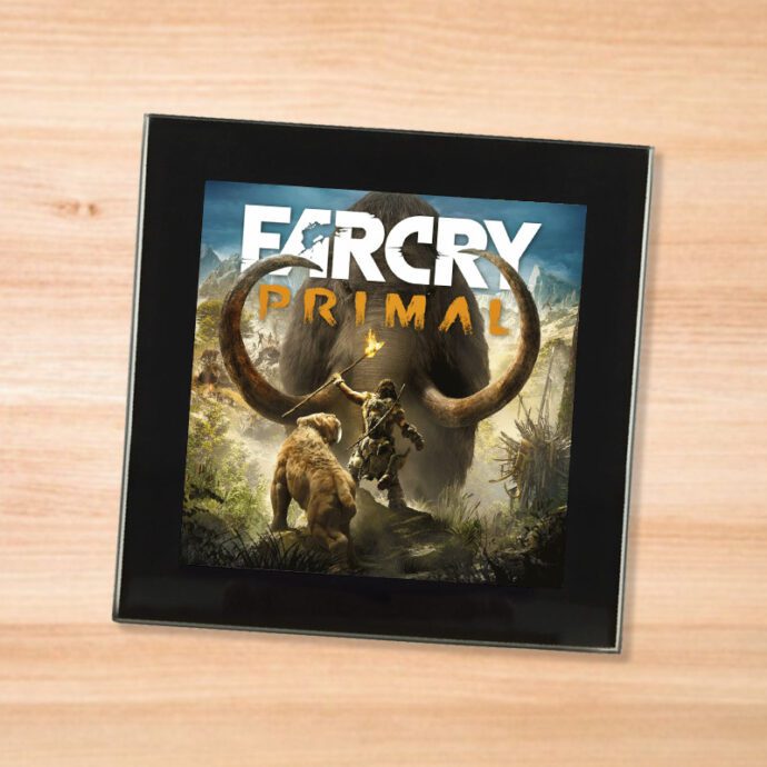 Black glass Far Cry Primal coaster on a wood table