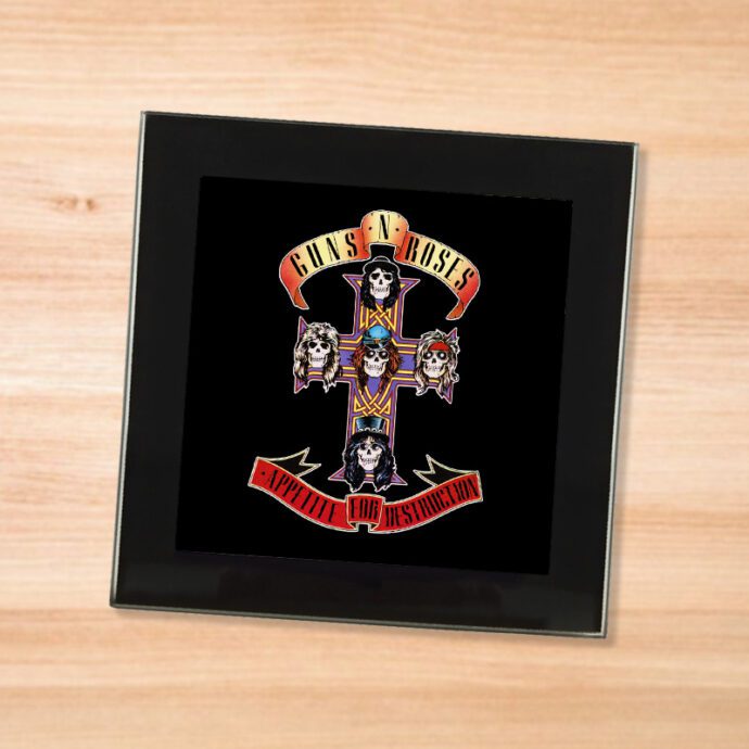 Black glass Guns N Roses - Appetite for Destruction coaster on a wood table