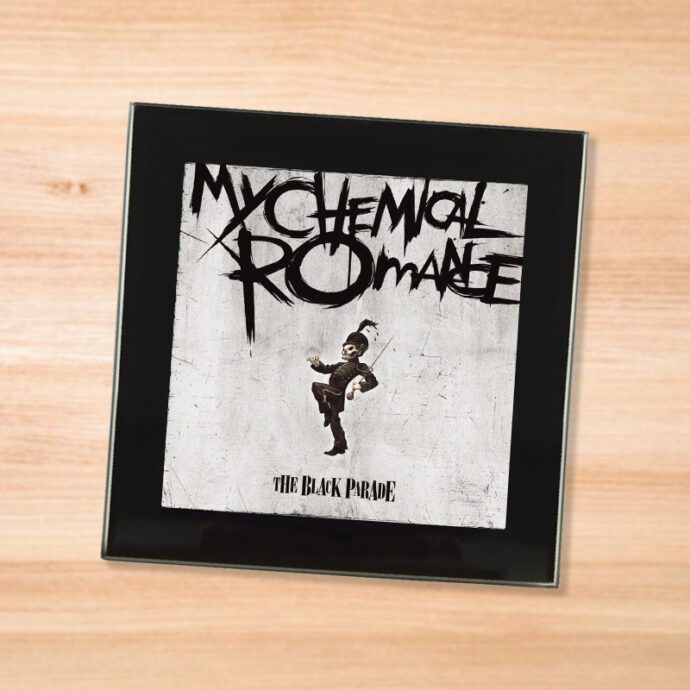 Black glass My Chemical Romance - Black Parade coaster on a wood table