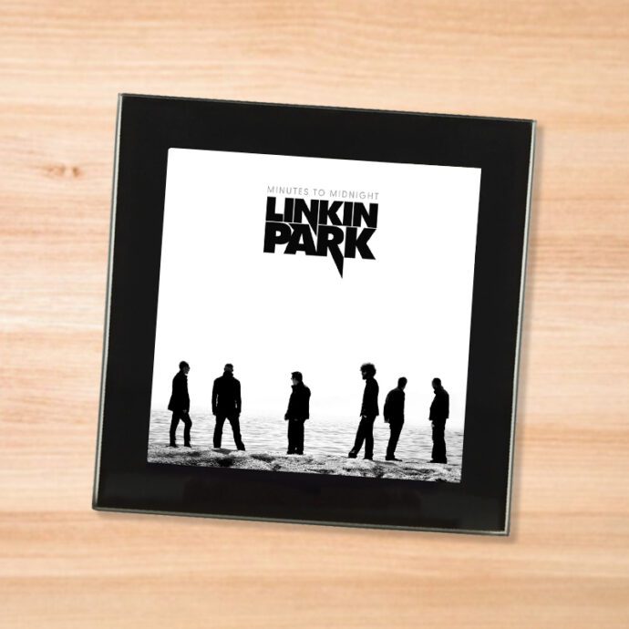 Black glass Linkin Park - Minutes to Midnight coaster on a wood table
