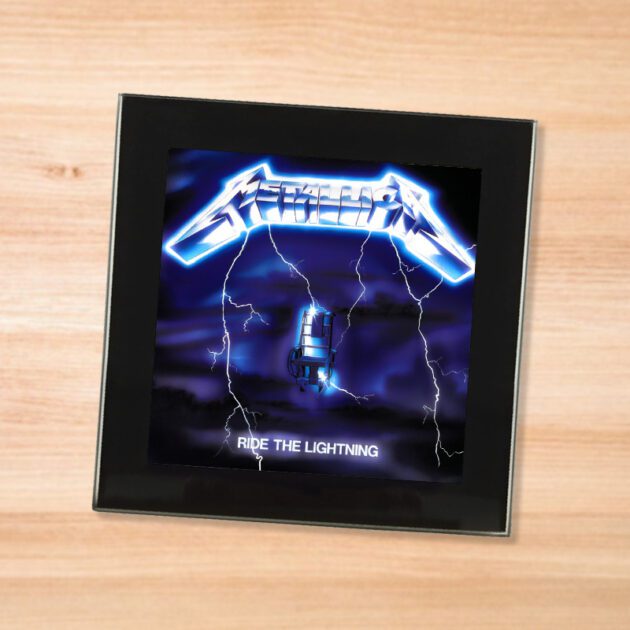Black glass Metallica - Ride the Lightning coaster on a wood table
