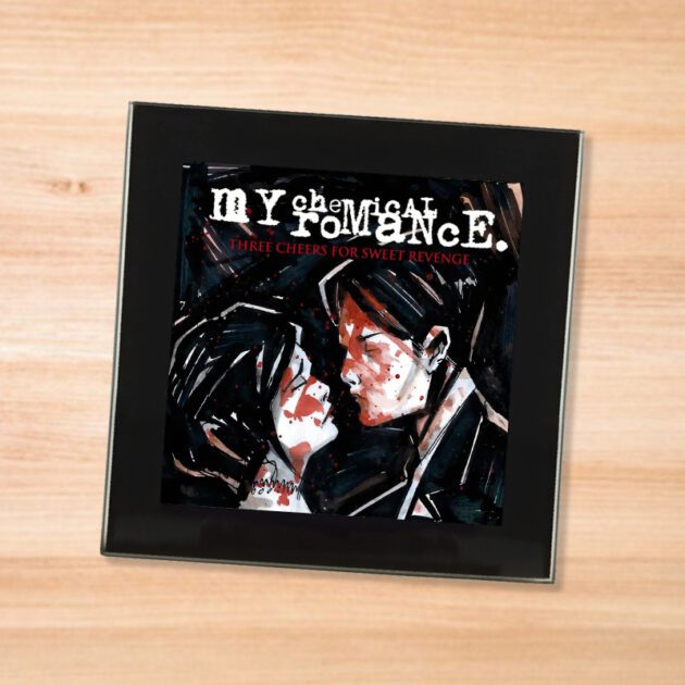 Black glass My Chemical Romance - Three Cheers For Sweet Revenge coaster on a wood table