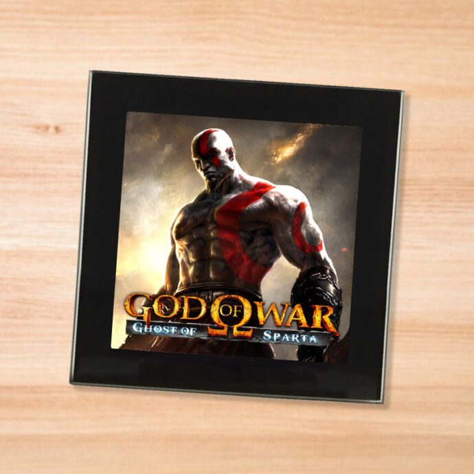 Black glass God of War Ghost of Spartacoaster on a wood table