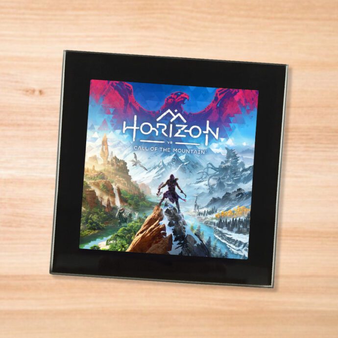 Black glass Horizon Call of the Mountain coaster on a wood table