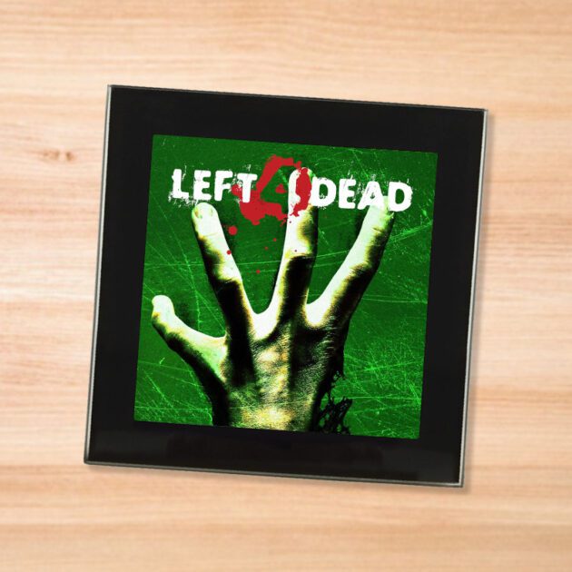 Black glass Left 4 Dead coaster on a wood table