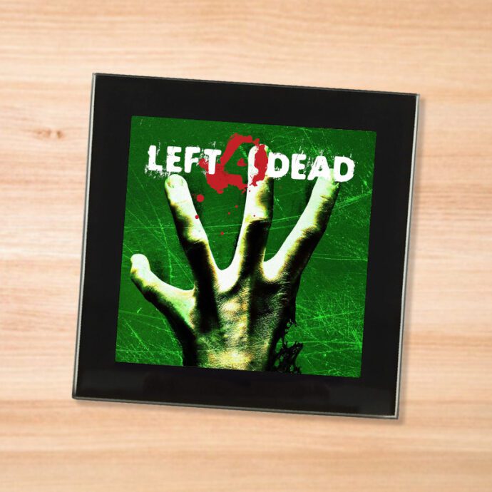 Black glass Left 4 Dead coaster on a wood table
