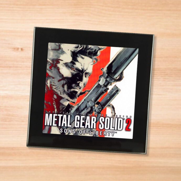 Black glass Metal Gear Solid 2 coaster on a wood table