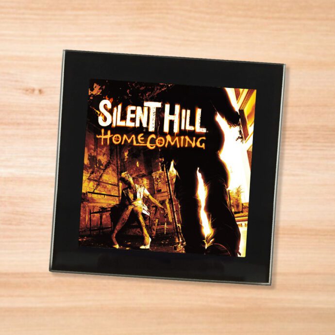Black glass Silent Hill Homecoming coaster on a wood table