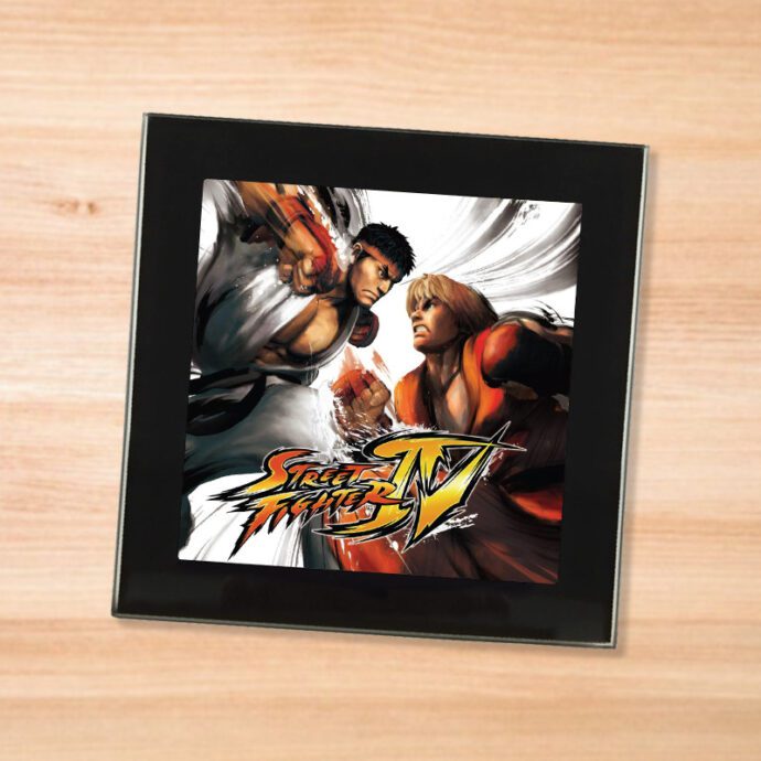 Black glass Street Fighter 4 coaster on a wood table