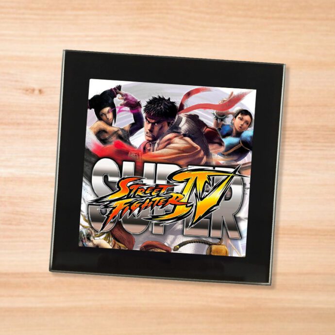 Black glass Street Fighter 4 coaster on a wood table