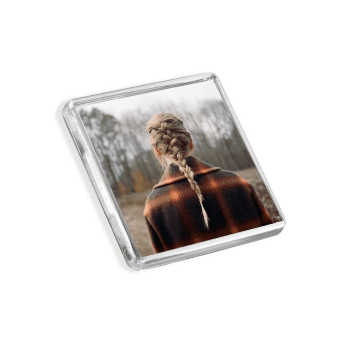 Plastic Taylor Swift - Evermore magnet on a white background