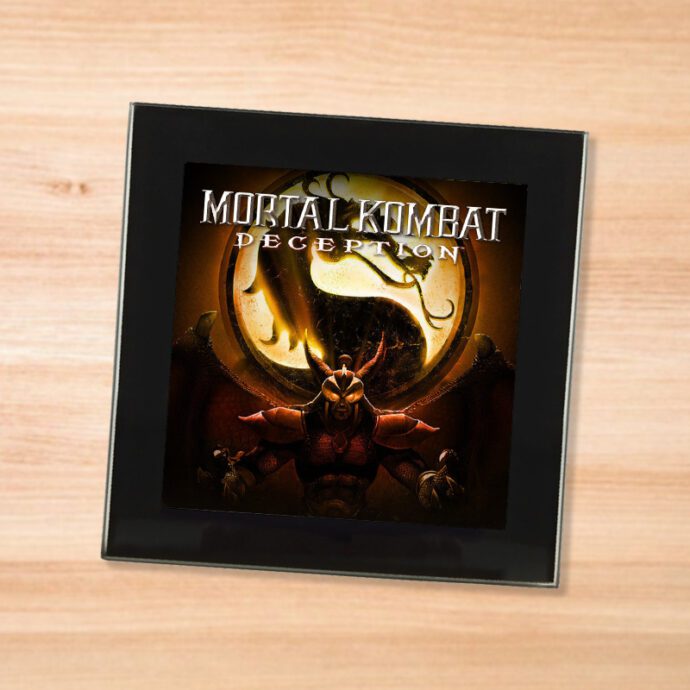 Black glass Mortal Kombat Deception coaster on a wood table