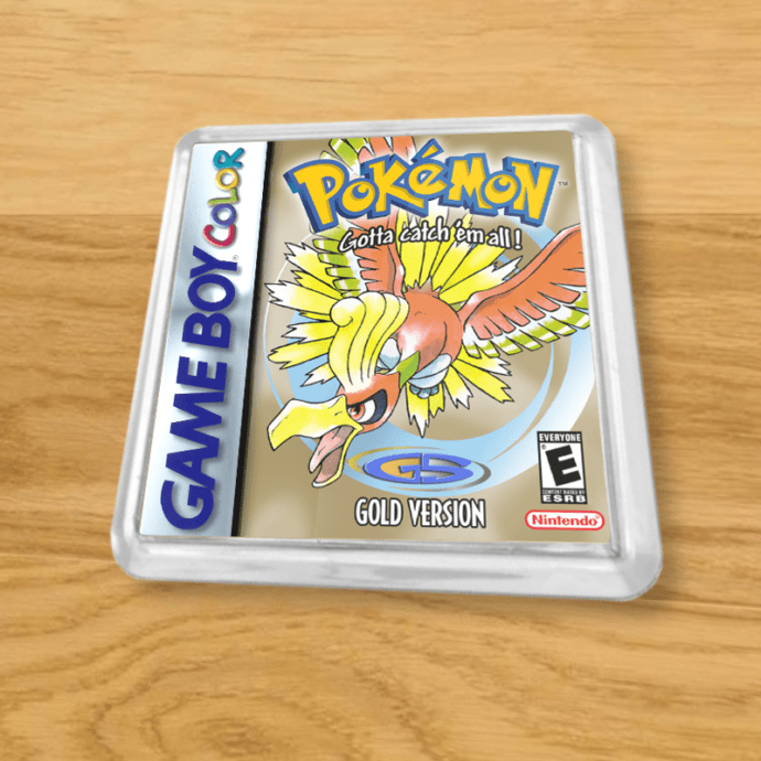Pokemon Gold plastic coaster on a wood table