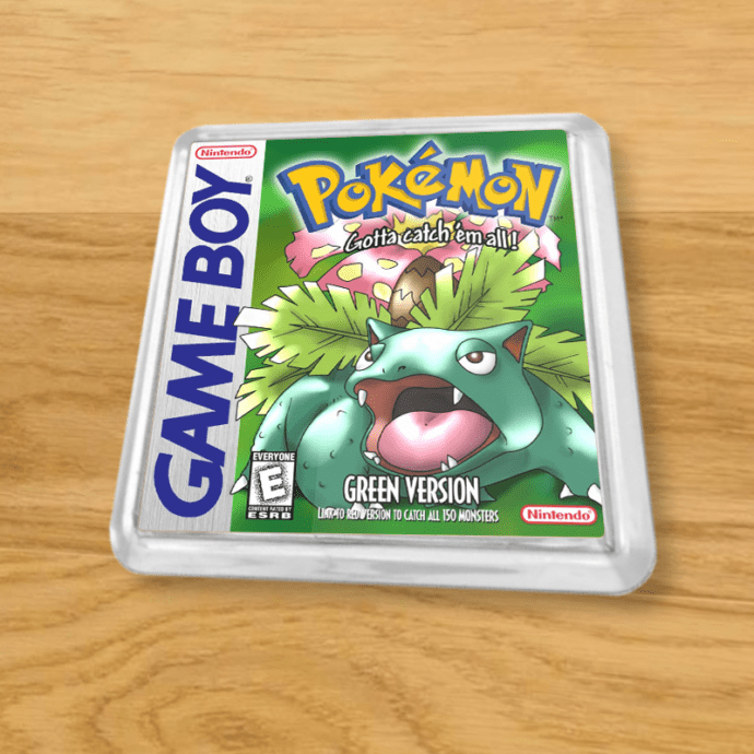 Pokemon Green plastic coaster on a wood table