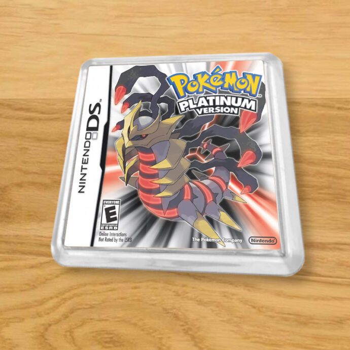 Pokemon Platinum plastic coaster on a wood table