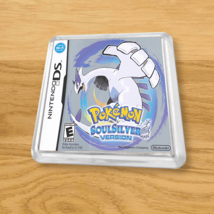 Pokemon Soul Silver plastic coaster on a wood table