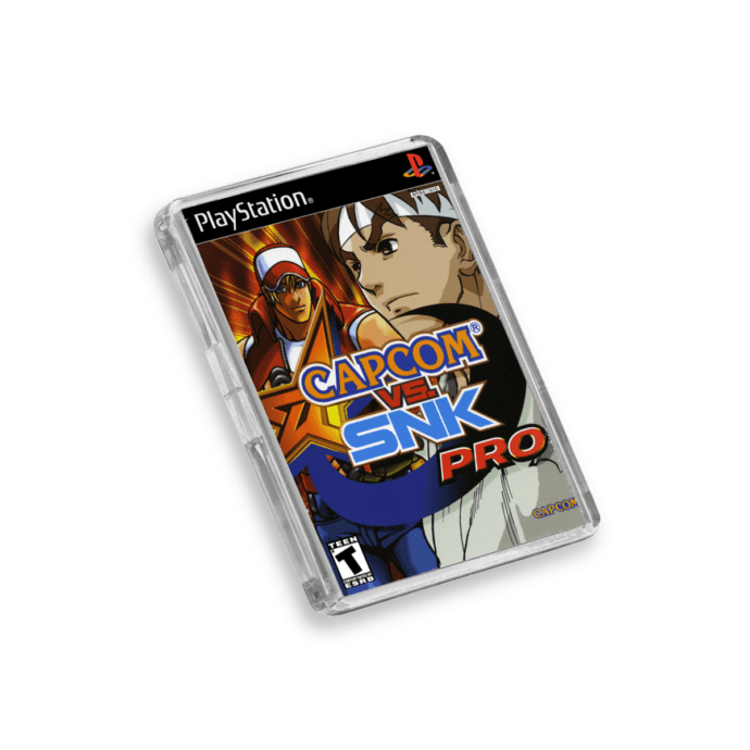 Plastic Capcom vs SNK PS1 fridge magnet on a white background