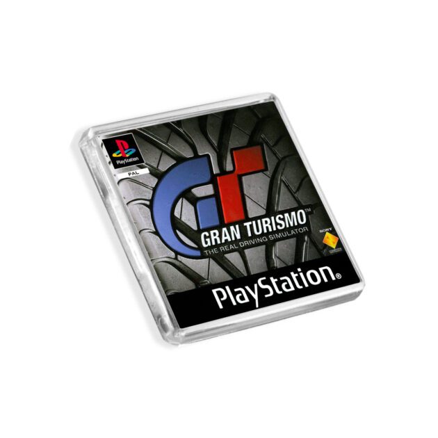 Plastic Gran Turismo PS1 fridge magnet on a white background