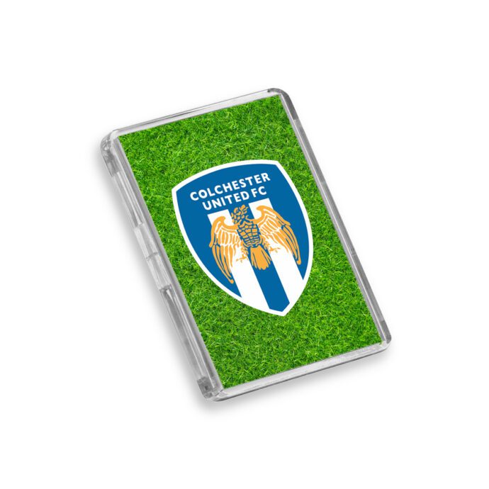 Plastic Colchester United fridge magnet on a white background