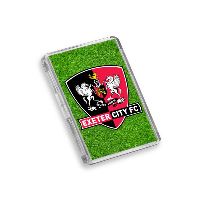 Plastic Exeter City fridge magnet on a white background