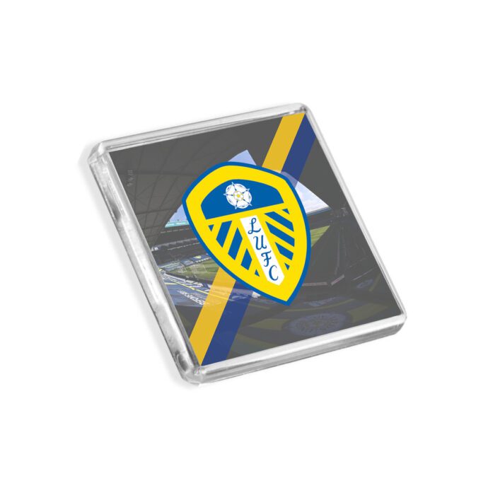 Plastic Leeds United fridge magnet on a white background