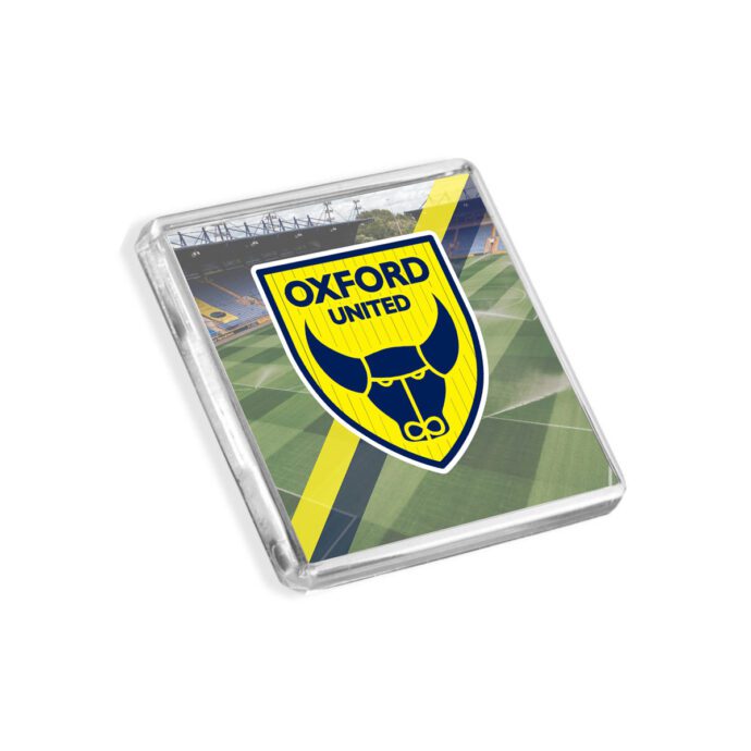 Plastic Oxford United fridge magnet on a white background