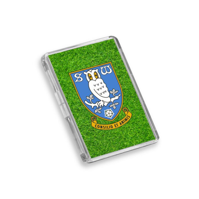 Plastic Sheffield Wednesday fridge magnet on a white background