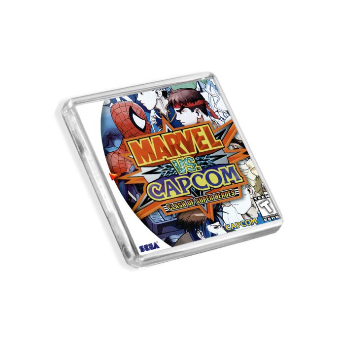 Plastic Dreamcast Marvel vs Capcom fridge magnet on a white background