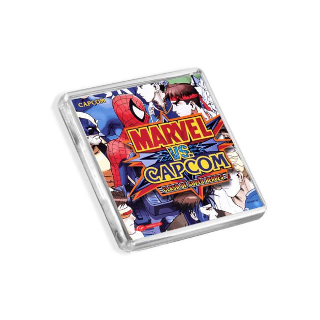 Plastic Dreamcast Marvel vs Capcom fridge magnet on a white background